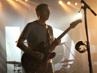 Guitarist Andy Bell from Ride during a concert in Berlin
