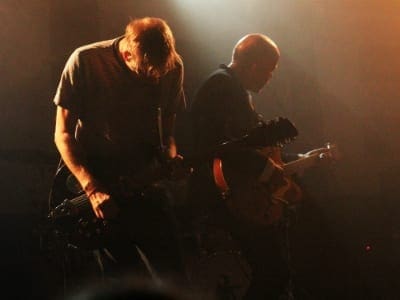 Mark Gardener and Andy Bell from Ride playing guitar at a concert in Berlin